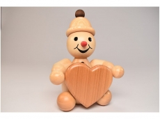Wagner - Snowman Junior sitting with heart