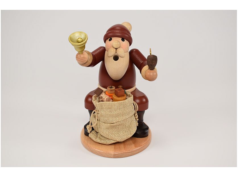 Dregeno - Smoking man Father Christmas sitting with bell and gift bag