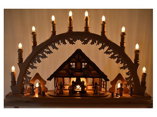 Lenk - candle arch house of the Ore Mountains with winter children and light
